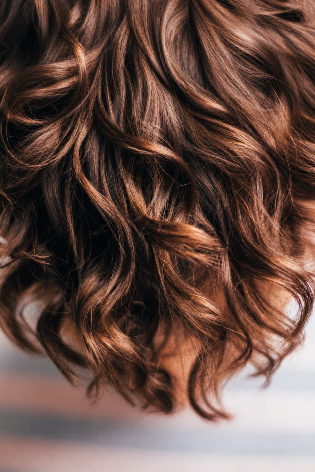 Glossy, healthy curls after a treatment at YK Salon